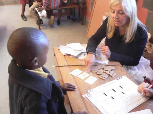 Dolen Cymru teachers delivering literacy training in Lesotho classrooms