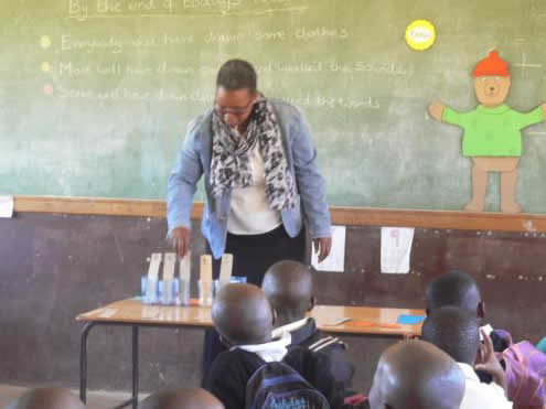 Dolen Cymru teachers delivering literacy training in Lesotho classrooms
