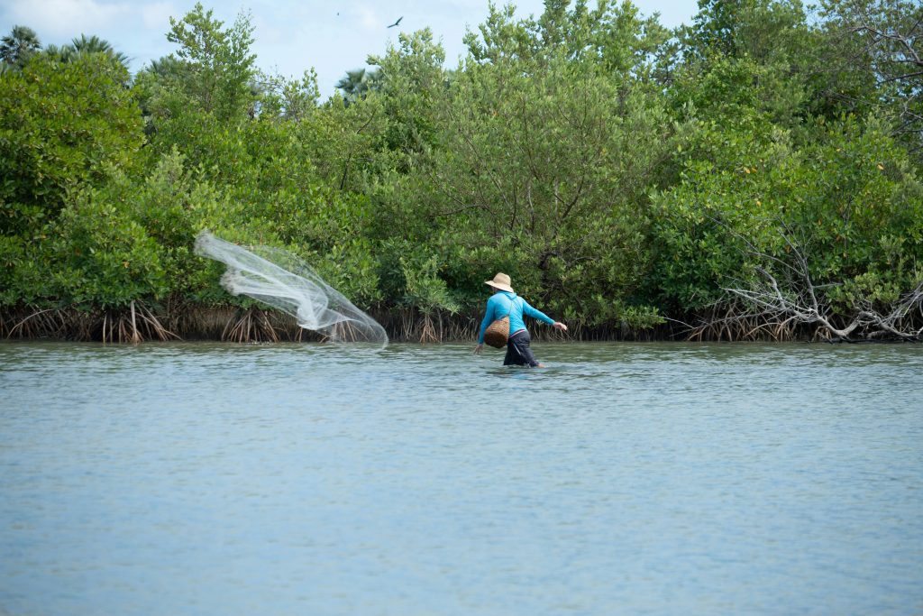 Photo of a local fisherman by Ravi Franco Lages on Pexels