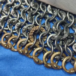 close up of rings showing brass makers ring and details of wedge shaped overlap 1