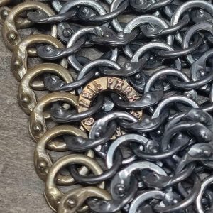 close up of rings showing brass makers ring and details of wedge shaped overlap 2