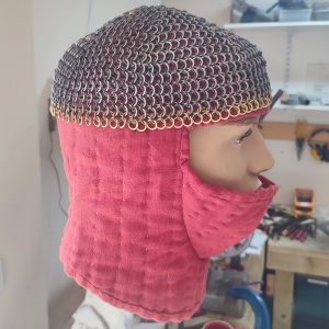 coif work in progress, tailoring to a linen liner