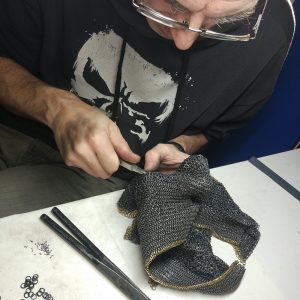 riveting links together